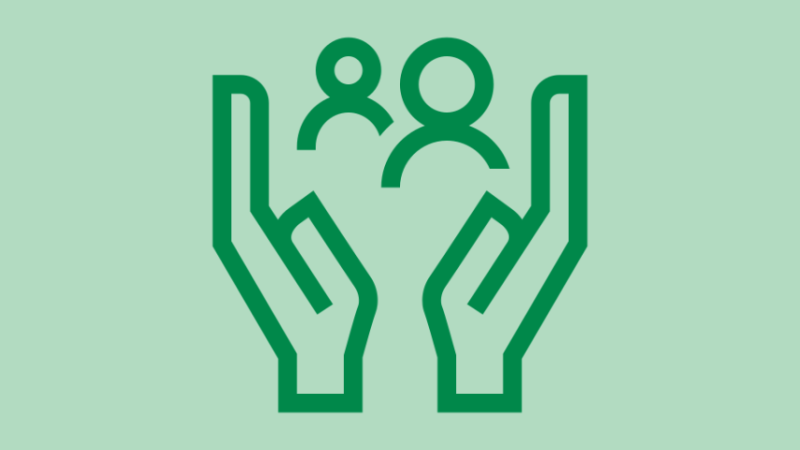 Icon: zwei Hände unterstützen zwei Personen